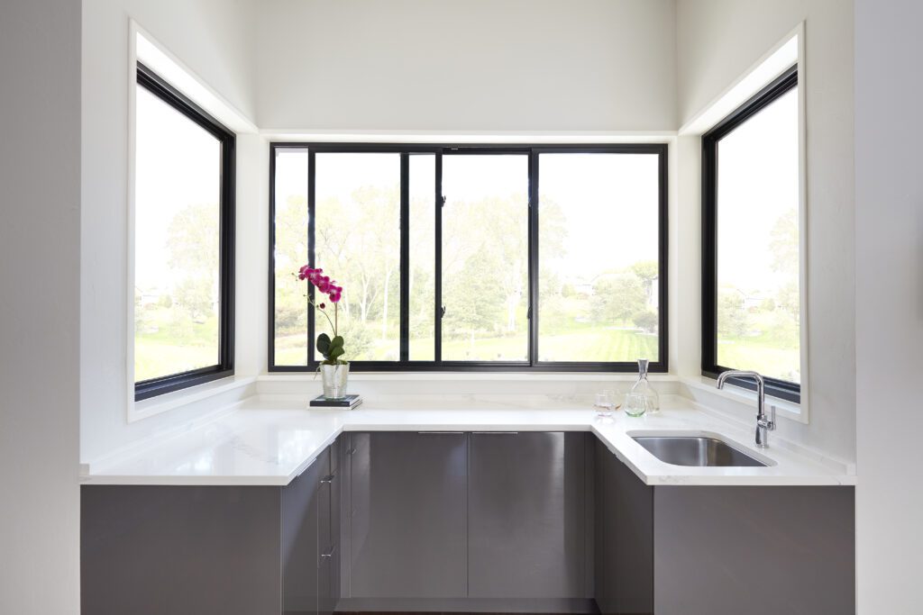 Black-Pella-Impervia-Fiberglass-Sliding-Windows-by-Prep-Area-in-Kitchen