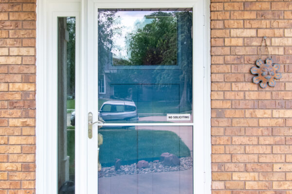 White Pella Rolscreen Storm Door