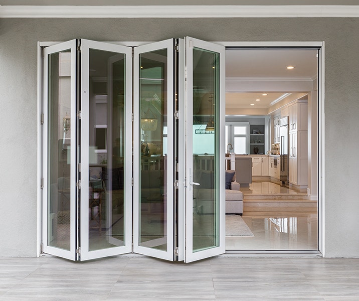 white-bifold-door-partially-open