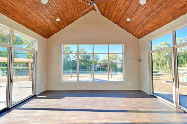 Modern farmhouse sun room with Pella windows